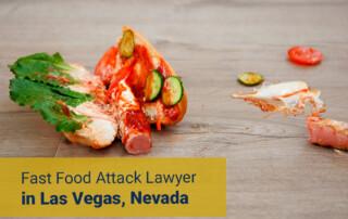 Partial sandwich with lettuce and tomato on a wooden surface; yellow banner reads "Fast Food Attack Lawyer in Las Vegas, Nevada."