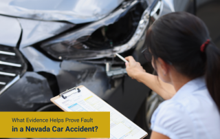Close-up of a damaged car front; a person in a white shirt checks a clipboard at the crash scene.